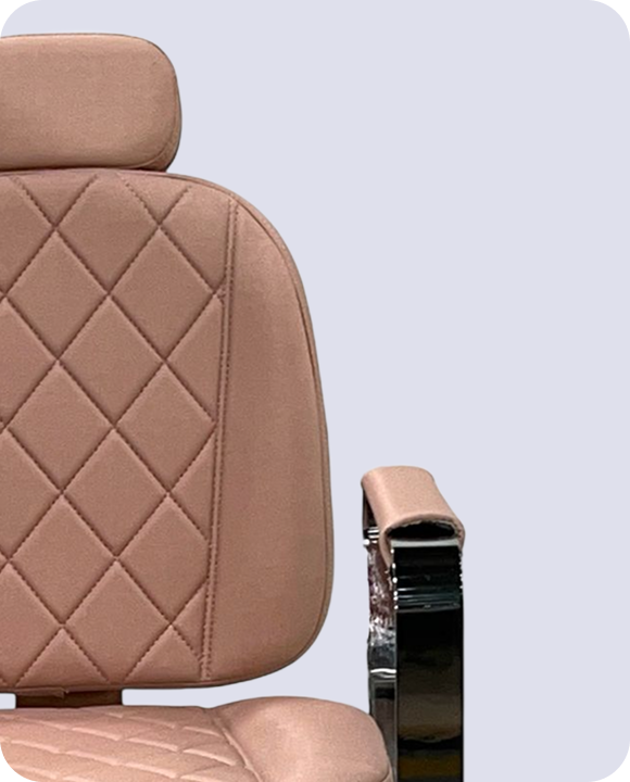 Close up of a dark wooden chair with black metal legs.